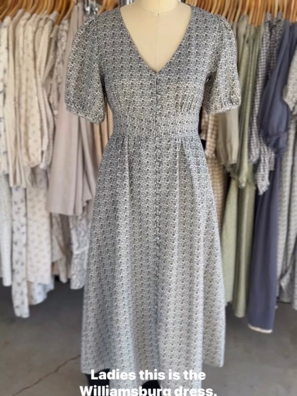 Smocked V‑Neck Midi Dress in Light Gray Floral